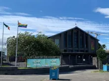 Our Lady of the Assumption Catholic Church, Ballyfermot, Ireland, displays the LGBT rainbow flag